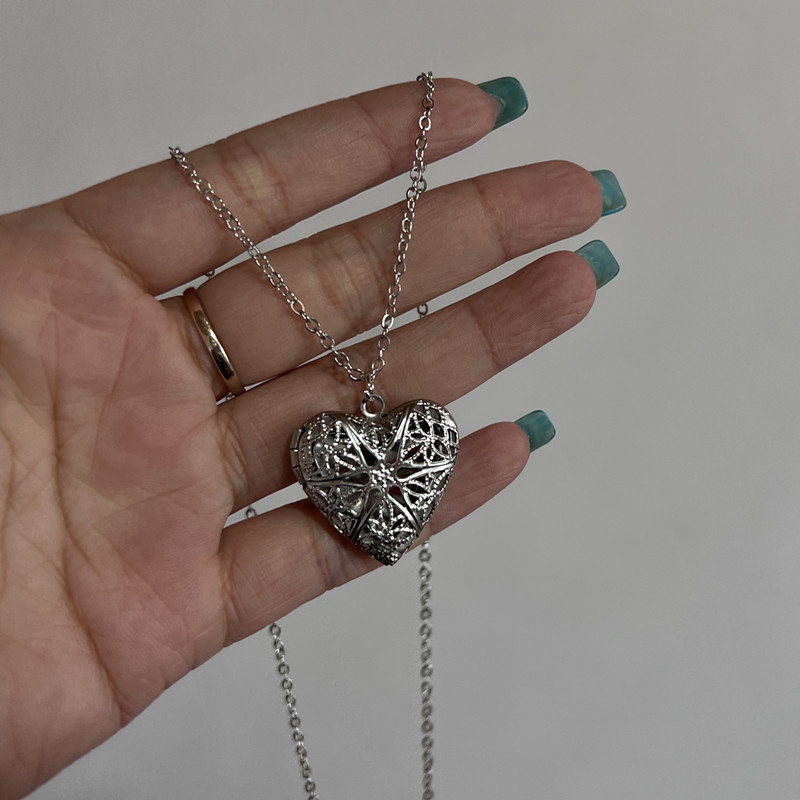 Collana con ciondolo con corni - Vintage Fashion Photos recensione e prezzo